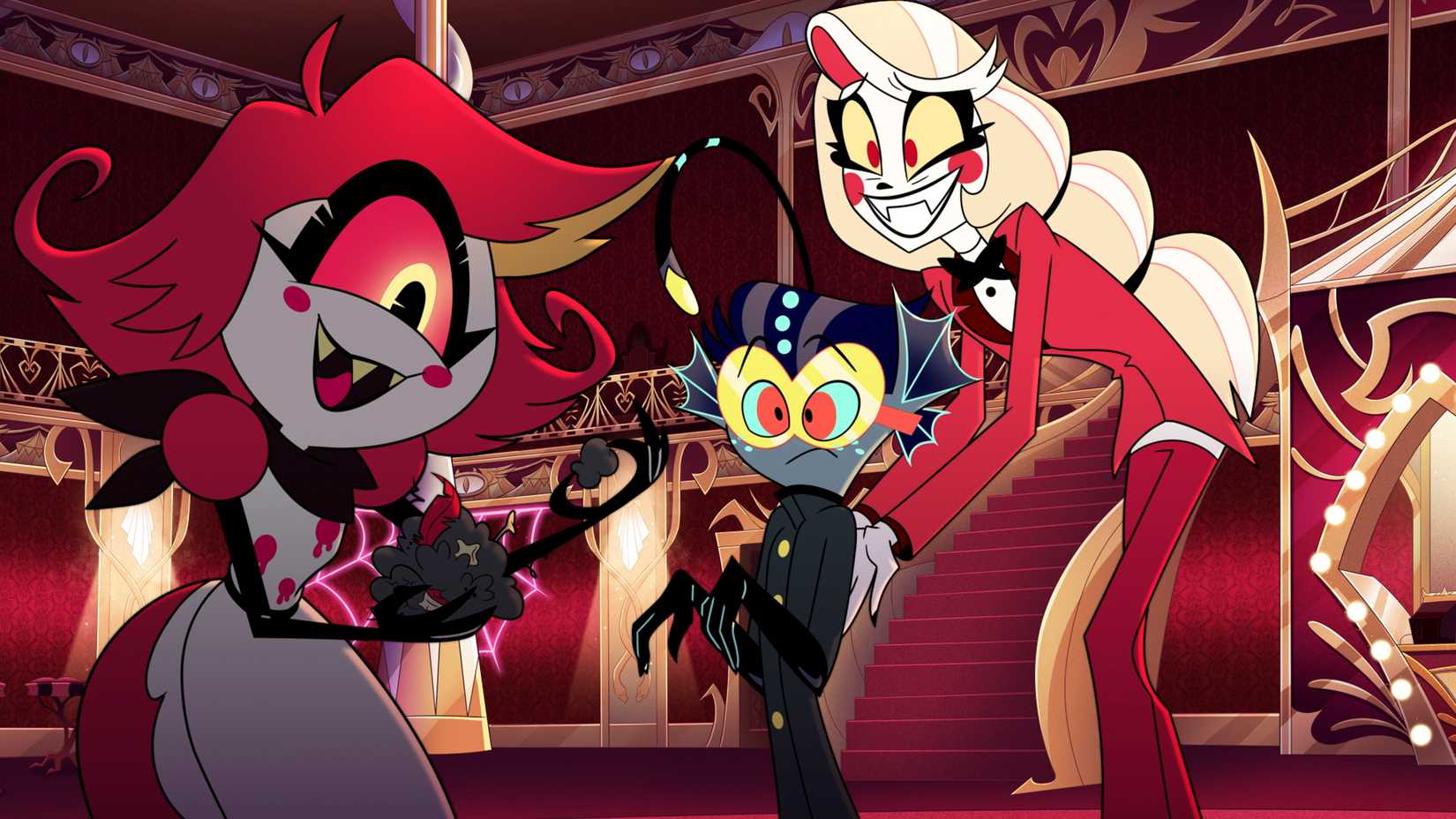 Charlie Morningstar, a human-like demon with long blonde hair, grins awkwardly while ushering a goggled, fin-headed, short demon toward grinning one-eyed demon Niffty in Hazbin Hotel season 2